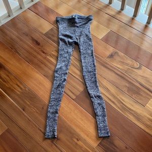 Free people 90 percent rayon 10% spandex leggings beige and black in color